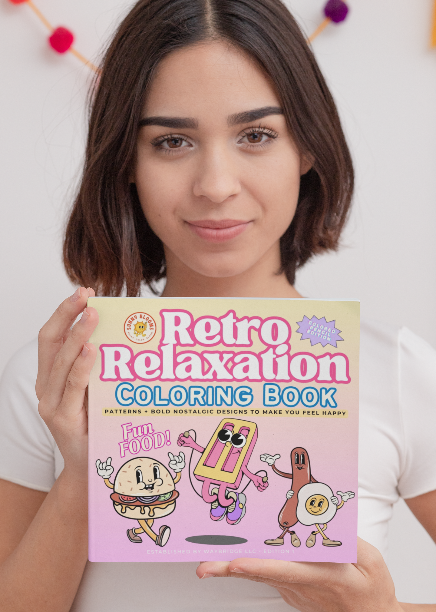 Smiling woman holding the Retro Relaxation Coloring Book – Fun Food Edition by Cheery Cherry Club.